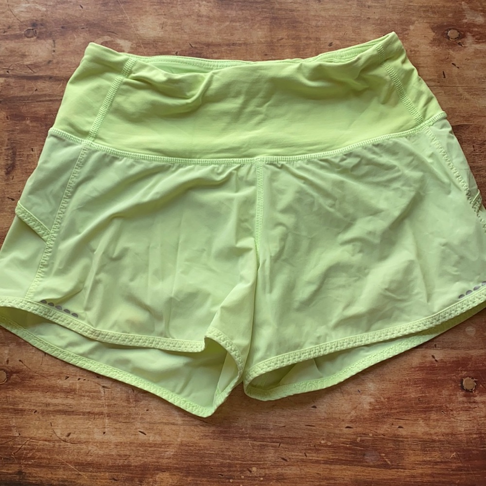 Green Lululemon shorts.